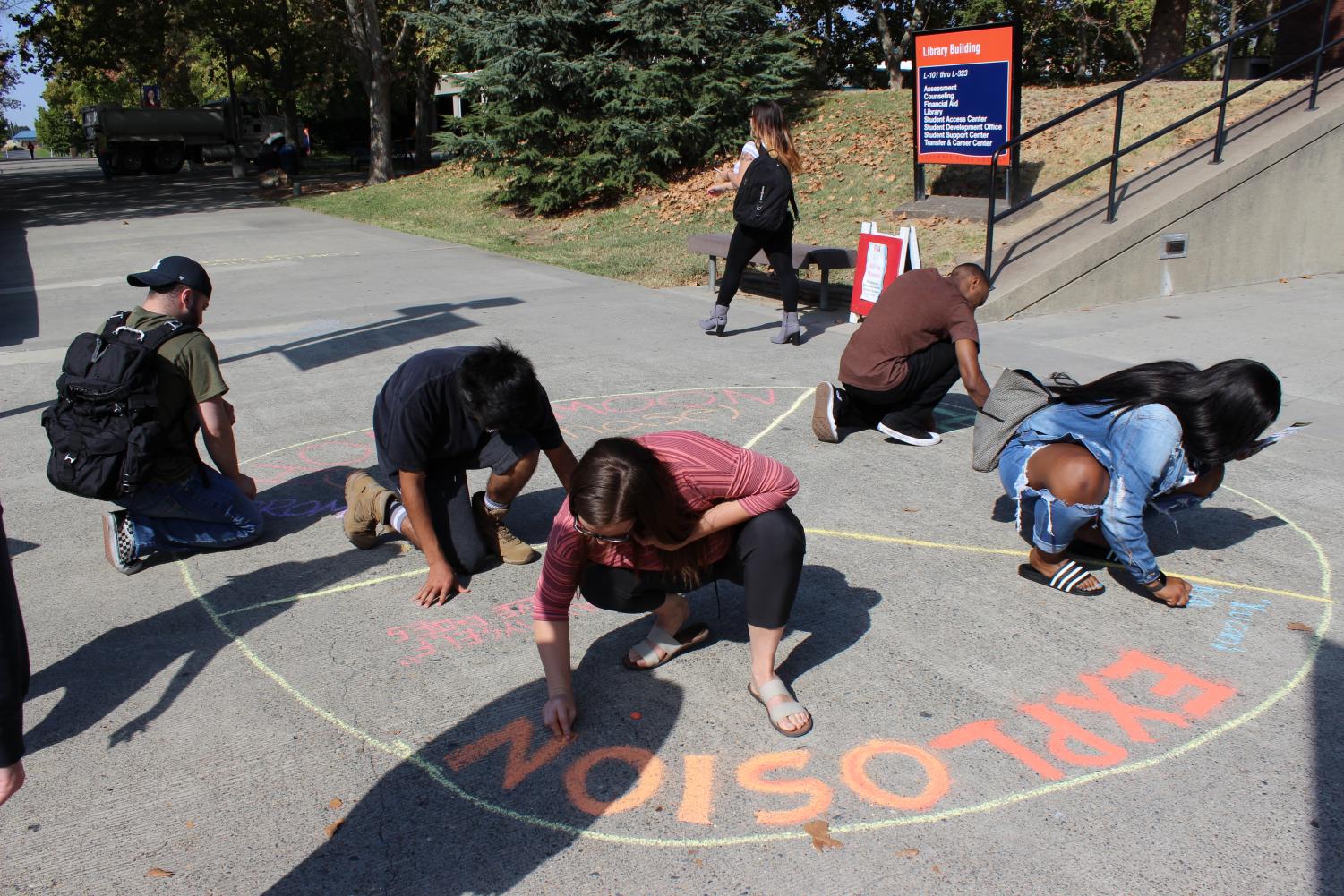 Chalk it Up event brings awareness to domestic violence