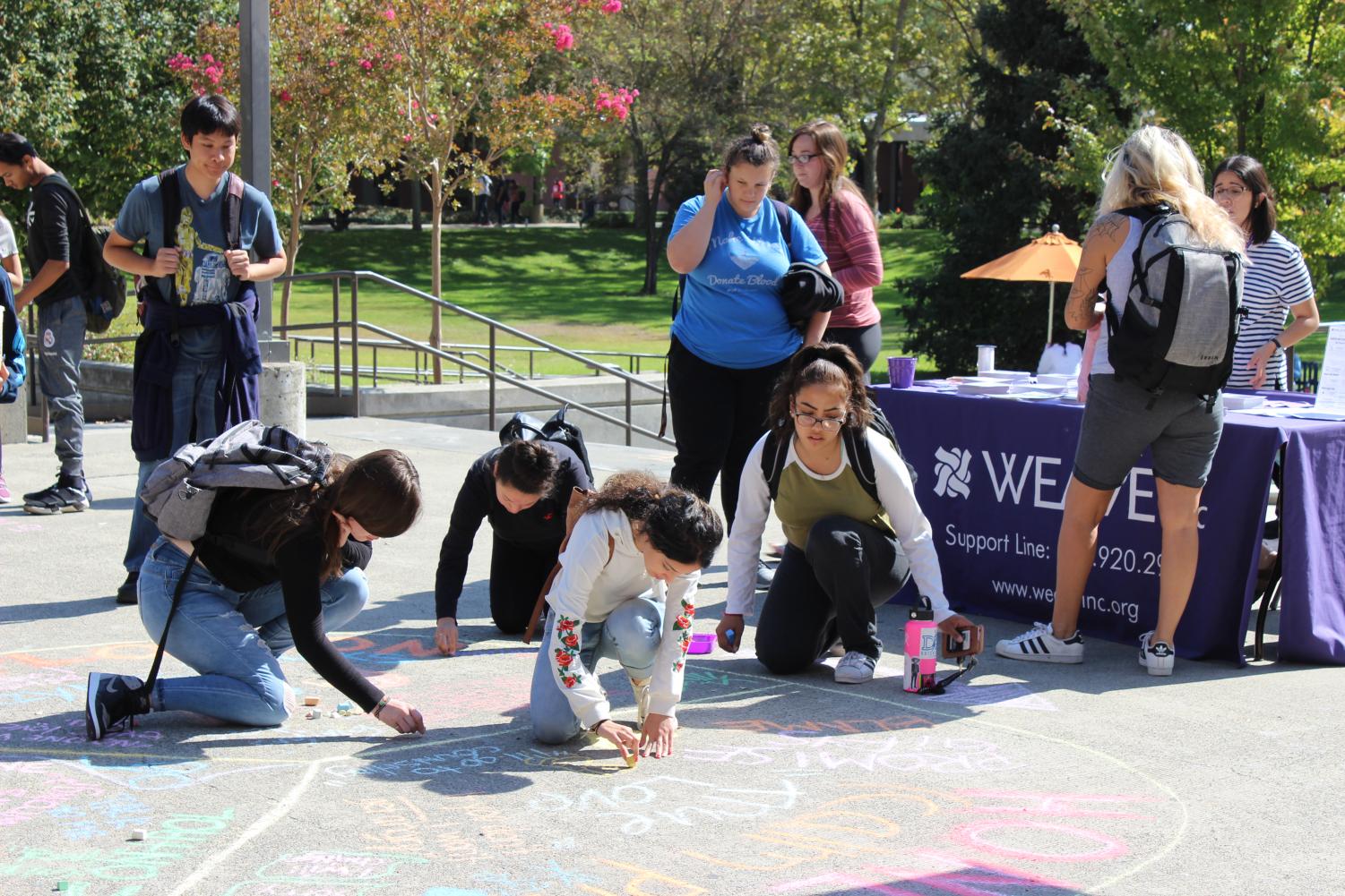 Chalk it Up event brings awareness to domestic violence