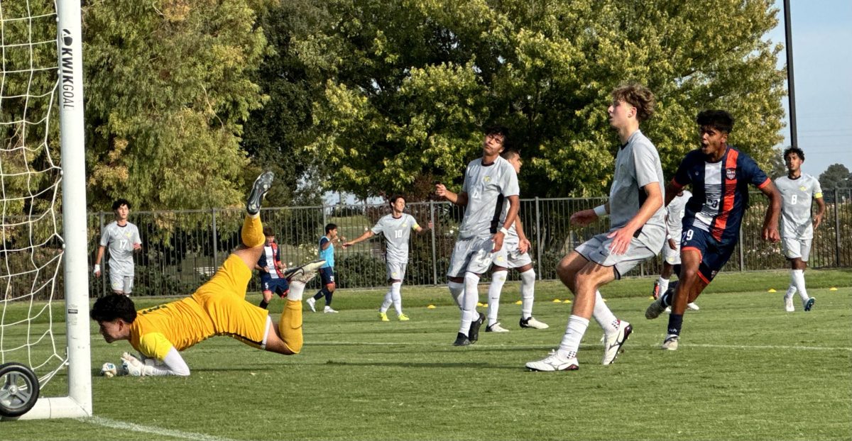 Freshman striker Brian Ramirez (right) scores a goal against the Canada Community College Colts on Tuesday at home. The Hawks go on to draw with the Colts at 2-2 and are scheduled to play the Merced Community College Blue Devils on Friday.