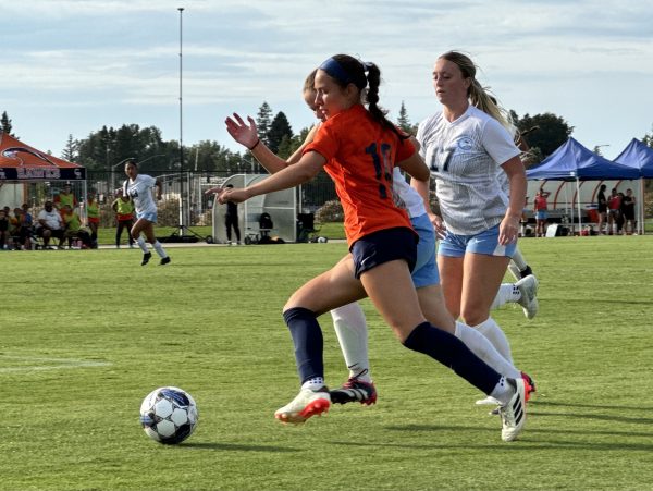 Freshman forward Mia Perz (center) kicks in a goal against the Cabrillo Community College Seahawks at home on Tuesday. The Hawks go on to dominate Cabrillo 6-0 and will face the Cañada Community College Colts in Redwood City on Friday.