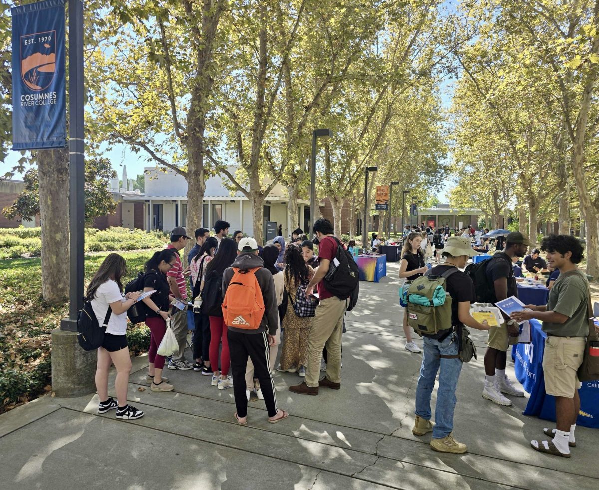 Students gather in the quad of Cosumnes River College on September 23 for Transfer Day. President of Administrative Services Theresa Tena said the campus is seeing increases in classes offered in person. 