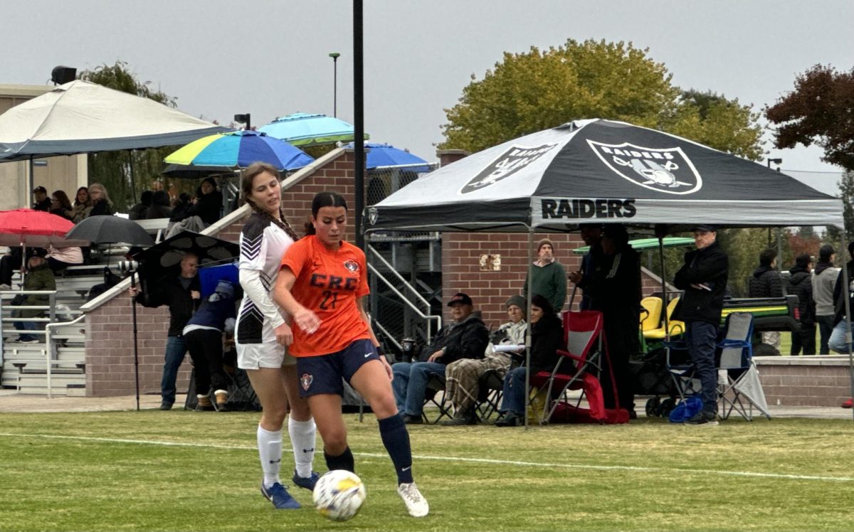 Hawks freshman defender Alicia Gonzalez maneuvers the soccer ball away from a Butte College Roadrunner during a rainy match in the first round of the 3C2A Women’s Soccer Northern California Regional Playoffs on Wednesday. The Hawks go on to shutout the Roadrunners 6-0 and will travel to Salinas, facing off against the 7th seed Hartnell College Panthers for round two on Saturday.
