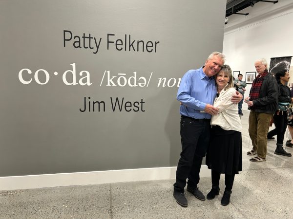 Professors Jim West and Patty Felkner at their photo exhibit in the Art Gallery on Jan. 30.  The show “Coda,” commemorates the work of the retiring professors, and is open for viewing through Feb. 20.