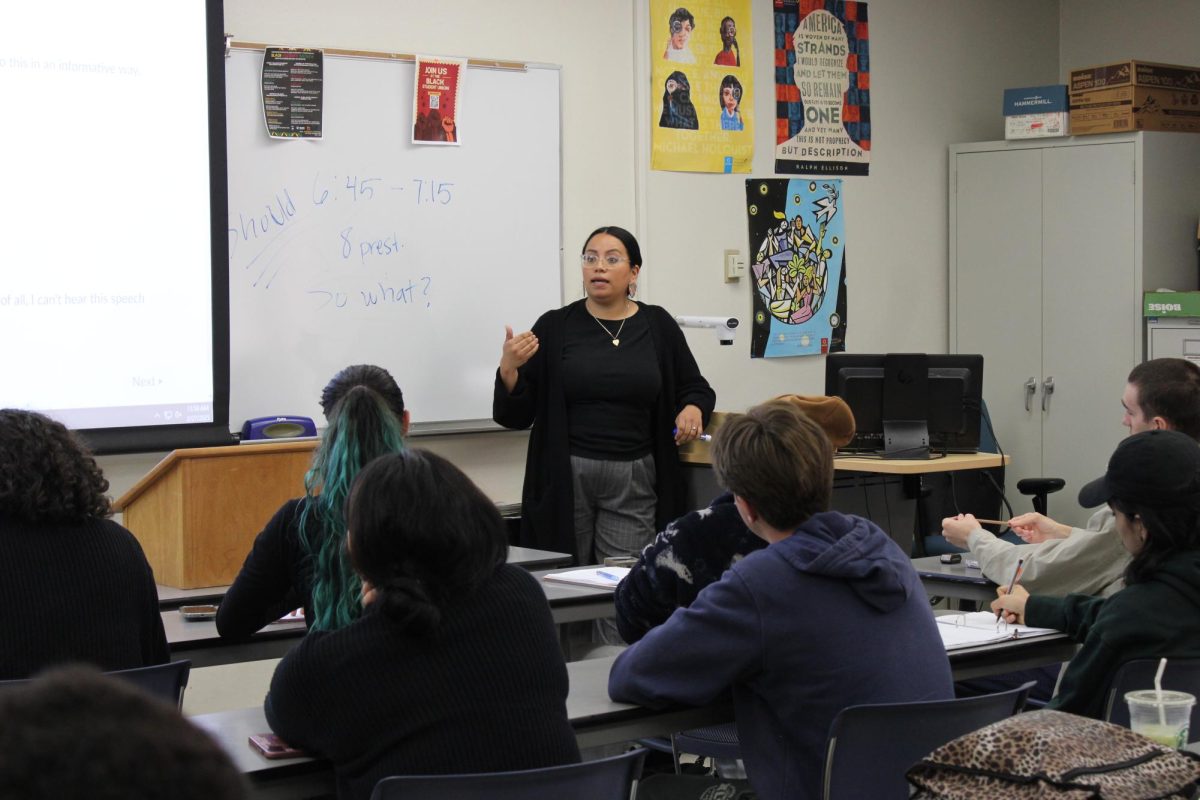 Communications Professor Ana Mercado giving a lecture in her classroom, located at BS-126. Mercado uses her past struggles to help support students through higher education.