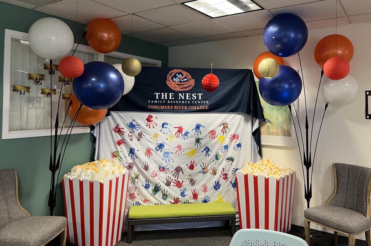 The seating area at The Nest, located at CDC-107, welcomes parents and children. The Nest, a part of The Child Development Center, provides resources for families in need.